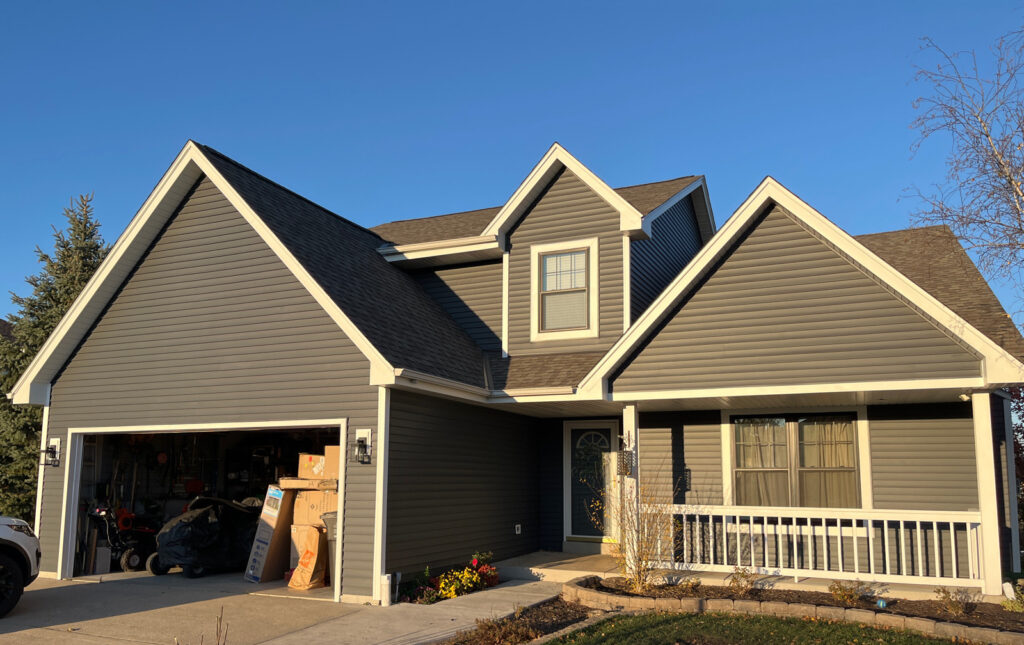 http://Finished%20house%20exterior%20with%20new%20roof%20and%20siding