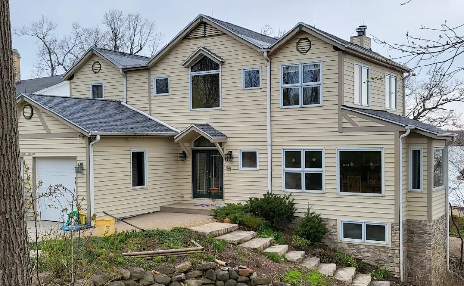 A home in Milwaukee with light creme colored siding