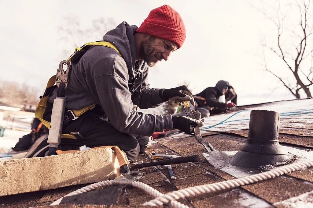 Semper Fi worker installing a new roof