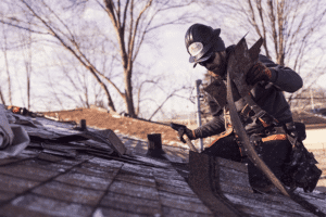 Roofing crew performing residential roof repair work